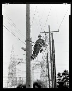 Shannon Fitch is a journeyman lineman for Seattle City Light and appears in the Galerie Fotoland's newest exhibit at Evergreen State College.