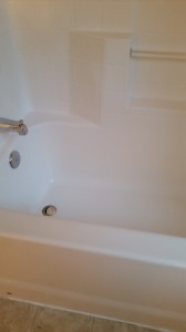 After the Maid Perfect staff cleaned this shower with Bar Keepers Friend, it looks nearly brand new.