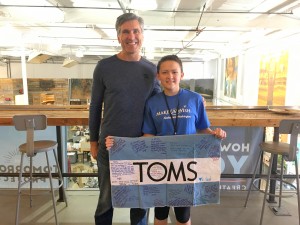 Allison, seen here with TOMS CEO Jim Alling, received a heart transplant at Seattle Children's Hospital in 2013 and this February, received the 6000th wish from Make-A-Wish Alaska and Washington.