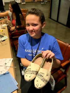 Allison spent time in TOMS creative space, designing her own pair of custom shoes reflecting her love of playing in the band.