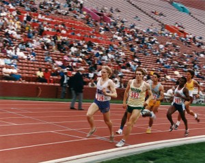 Mike Michael (first) running at the UW, leading a pack of runners in his signature race, the mile.