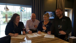 The Roberts Family (from left, Carrie, Blain, Kim and Dana) celebrate a new partnership at Westport Winery Garden Resort.