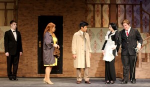 The Addams parents, Morticia (second from right) and Gomez (far right) are played by CHS seniors Sophie Parody and Ryan Grey.