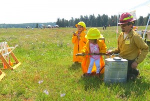 Children engage in activities learning about the use of prescribed fires on the South Sound Prairies at Prairie Appreciation Day 2015. Credit: Carola Tejeda