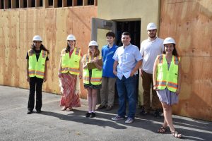 Pope John Paul II students offer a tour of the school expansion project. (left to right) Alexandra Rivera, class of 2017, Megan Bohlig, class of 2017, Felicia Bristow, class of 2017, Colin Meenk, class of 2016, Lucca Charneski, class of 2017, Ryan Borden, class of 2017 Magdalene Marsh, class of 2017. Photo credit: Tammy Joy Losey