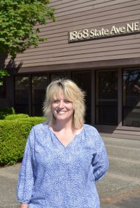Tawnia in front of the office where she has work for Rob Rice for 17 years. Photo courtesy: Rob Rice Homes