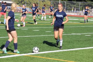 Olympia High school girls soccer players work on ball-handling skills at a recent practice. Photo credit: Gail Wood.