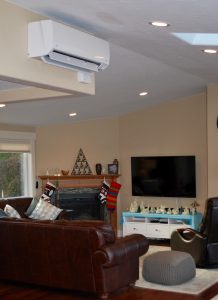 Ductless heat pumps are easily mounted high on a wall where they can distribute warm and cool air throughout the space. 