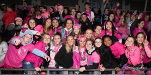 Olympia High School students show their support for Breast Cancer Awareness Month by wearing pink at a home game. 