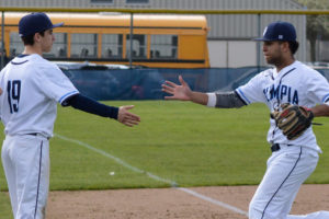 Olympia High School Baseball Derek Weldon Kevin Flannery (No. 19) and Zach Johnson (No. 3) 