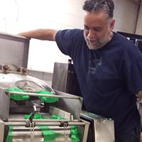 Olympia Food CoOp Eddie Lucero rollin' out the Green Jalisco Tortillas