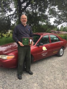 South Sound Solar Kirk Haffner with award