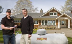 Acme Propane Employee and New Home Owner front yard