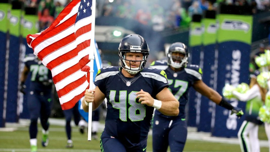 Nate Boyer Carries Seahwaks Flag