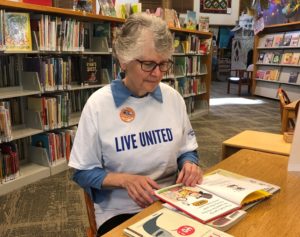 Panorama Reading Buddies Judy Murphy perusing books