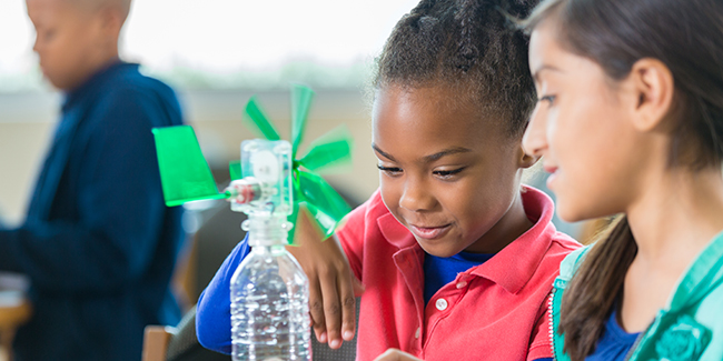 Students building windmill during elementary science class