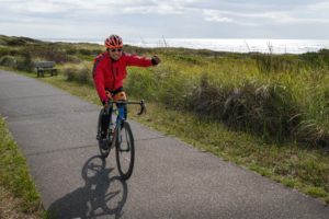 reach the beach cyclist on path