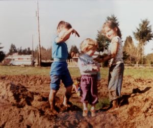 Northwest Sausage & Deli Julie & cousins playing in the dirt