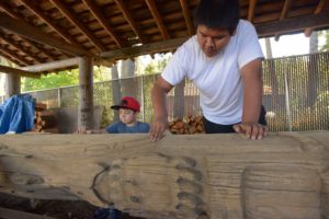 Sanding the totem pole