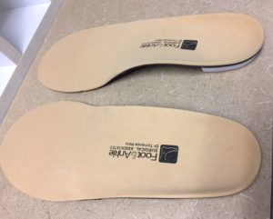 Foot and Ankle Surgical Associates tan inserts