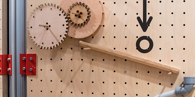 Wooden constructions to create a pipes path to a ball.