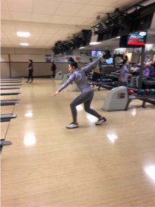 North Thurston High School girls bowler, purple shirt