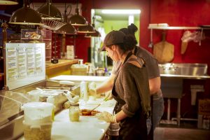 Stone Creek Wood Fired Pizza Employees Preparing Pizza