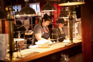 Stone Creek Wood Fired Pizza Employees Preparing Pizza Maggie