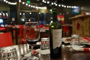 Pizzeria La Gitana Table with Wine and Glass