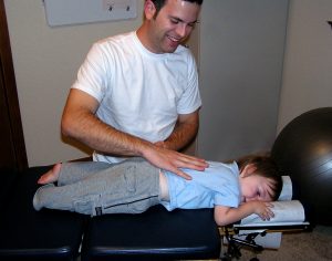360-Chiropractic-Dr-George-Olar-child-adjustment.