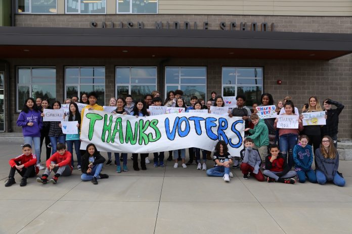 students outside the new Salish middle school