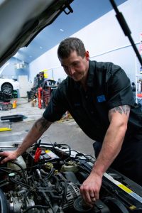 Boss Auto Repair in Olympia Auto Shop Lacey Owner Gary Morrison Fixing Car