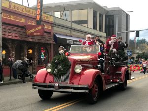 Olympia Downtown Alliance Downtown For the Holidays WSECU Jingle Bell Parade Santa and Mrs Claus