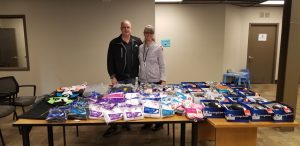 Jones and Brenda McAferty, North Thurston Public School's Homeless Liaison, gather clothing and other items for students in the district.