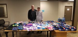 Jones and Brenda McAferty, North Thurston Public School's Homeless Liaison, gather clothing and other items for students in the district. 