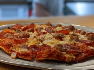Dirty-Daves-Pizza-Parlor-Most-Loved-Menu-Items-Exterior-Gay-90s-Special-Pizza