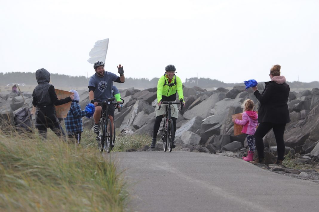 Summit-Pacific-Elma-Tour-de-Wellness-racers-on-road