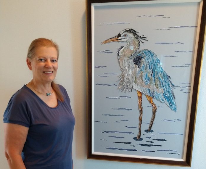 Eunice-King-with-Heron Eunice-King-with-Heron