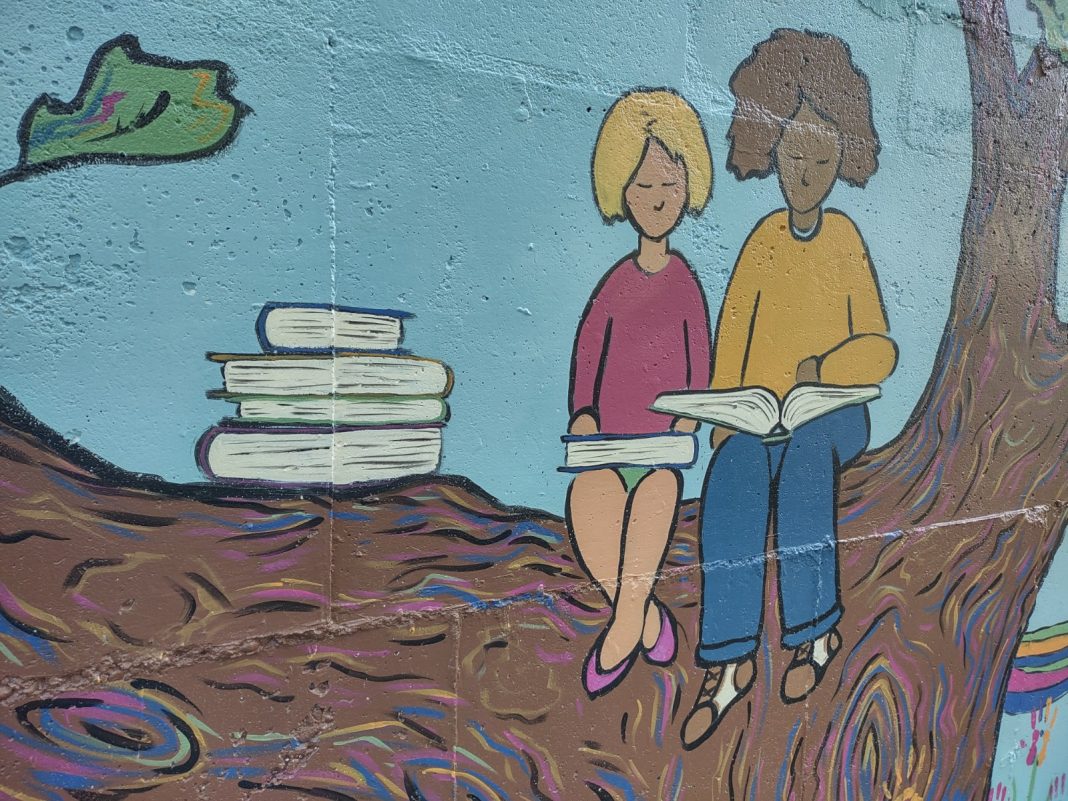 Eastside-Neigborhood-Association-Laurel-Henn-Mural-book-theme