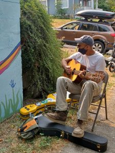 Eastside-Neighbohood-Association-Laurel-Henn-mural-volunteer-music