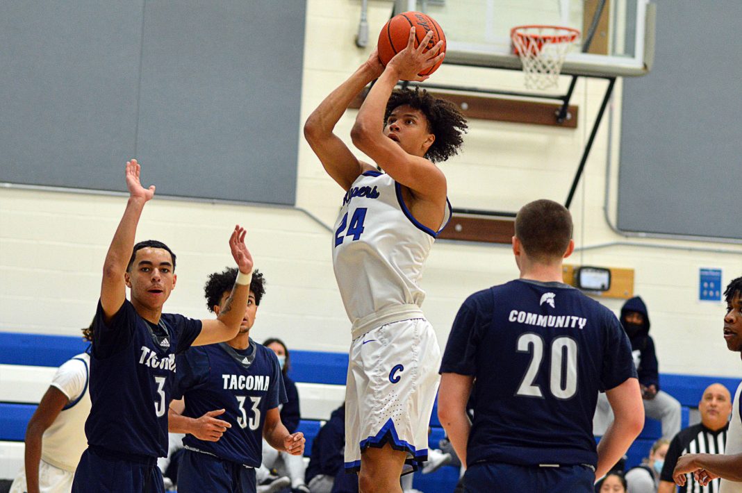 South Puget Sound Community College men's basketball player going for a basket