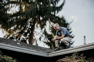 home inspector on roof
