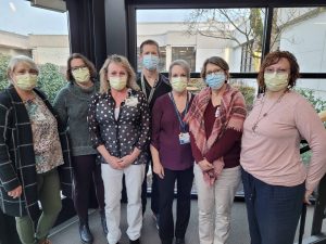 Group of Mason Health care team posing with masks