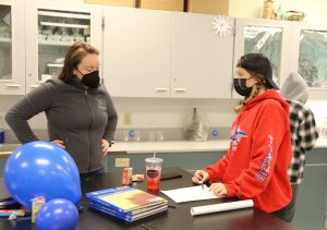 Komachin Middle School teacher Katie Standlea works closely with science students to get hands-on experiences.