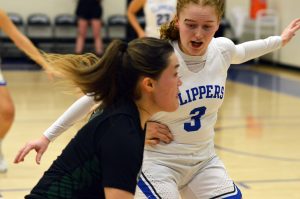 SPSCC freshman guard Kayla Jackson blocks an opponent on the court