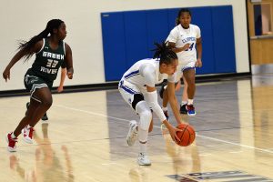 Sharay Trotter scopes up a loose ball during the Clippers home win over Green River.