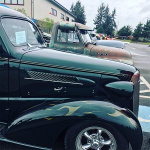 A line of classic trucks at Nisqually Valley Home & Garden Show 