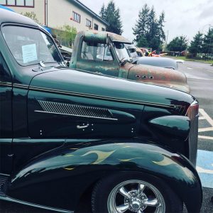 A line of classic trucks at Nisqually Valley Home & Garden Show