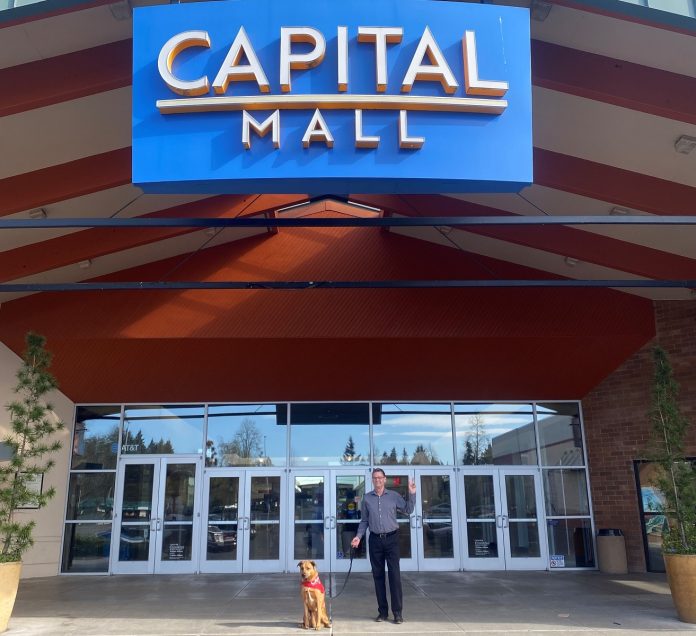 dog and owner outside of Capital Mall