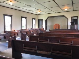 new pews inside Rainier School & Zion Evangelical Church